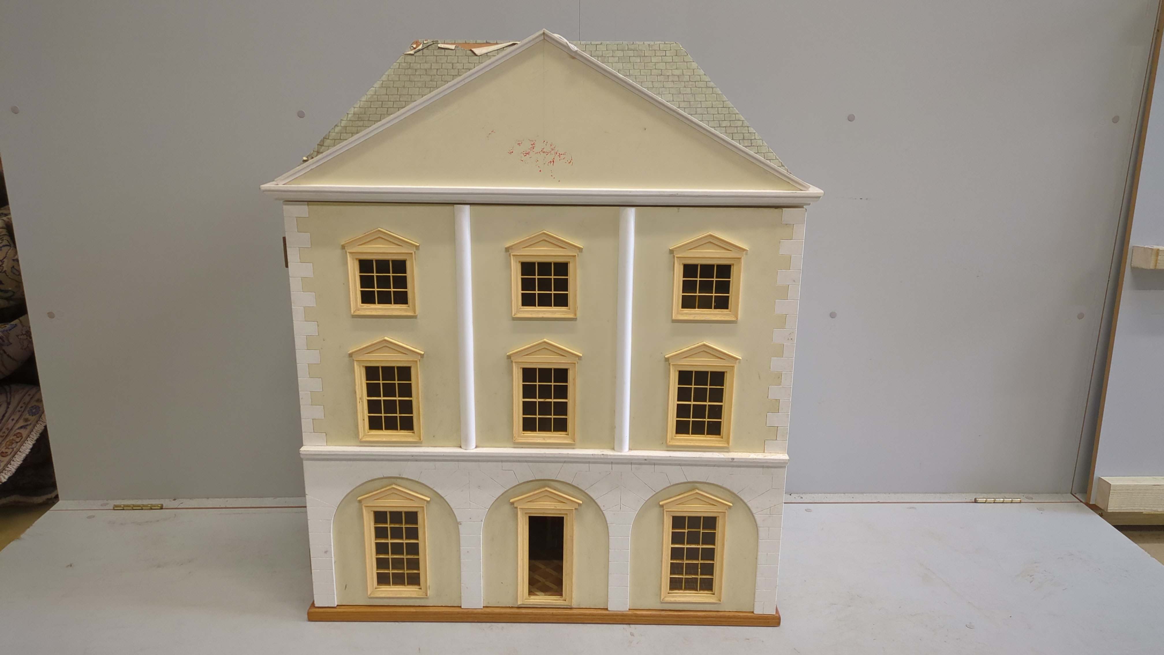A modern Georgian style dolls house and accessories, the house is divided into six rooms on three floors, together with a collection of furniture and accessories, house dimensions; 103cm high, 90cm wide and 44cm deep